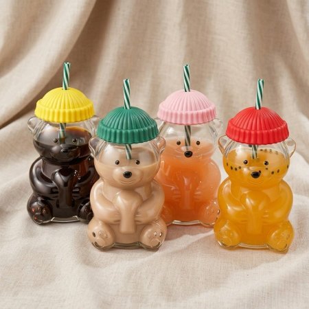 مج زجاجي مع غطاء على شكل دب ومصاصة قابلة لإعادة الاستخدام